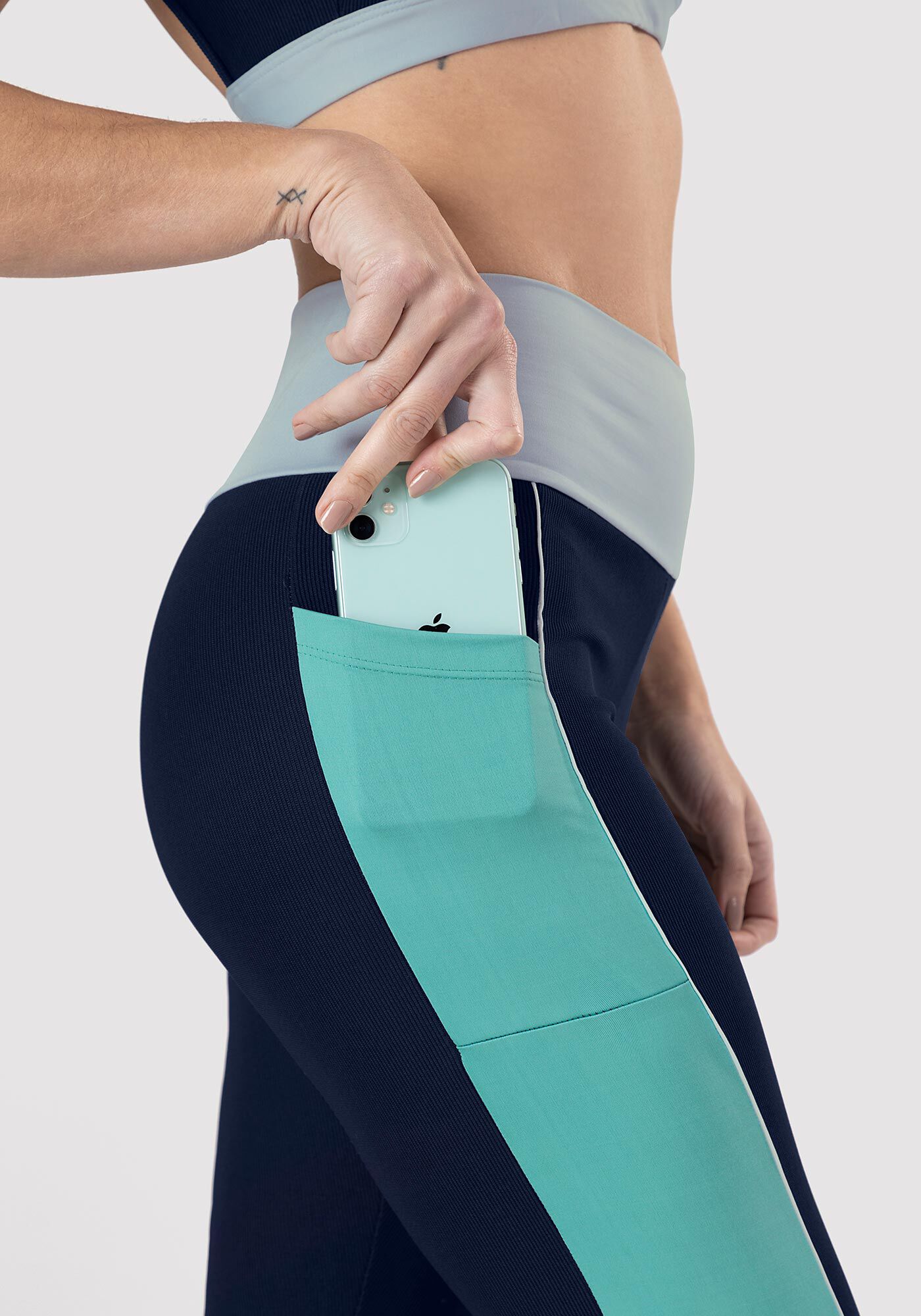 Calça legging shop com bolso lateral